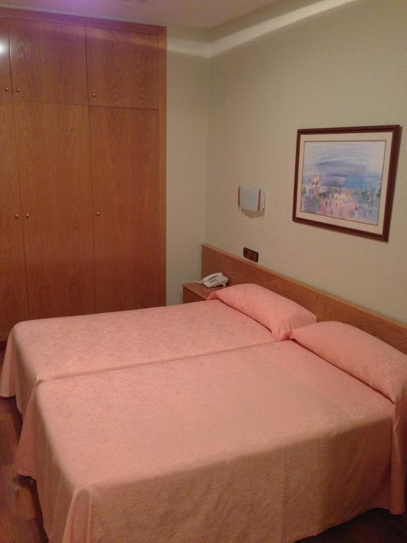 Doppel- oder Zweibettzimmer