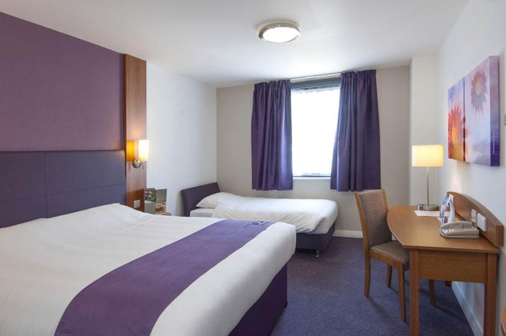 Economy Vierbettzimmer mit Gemeinschaftsbad