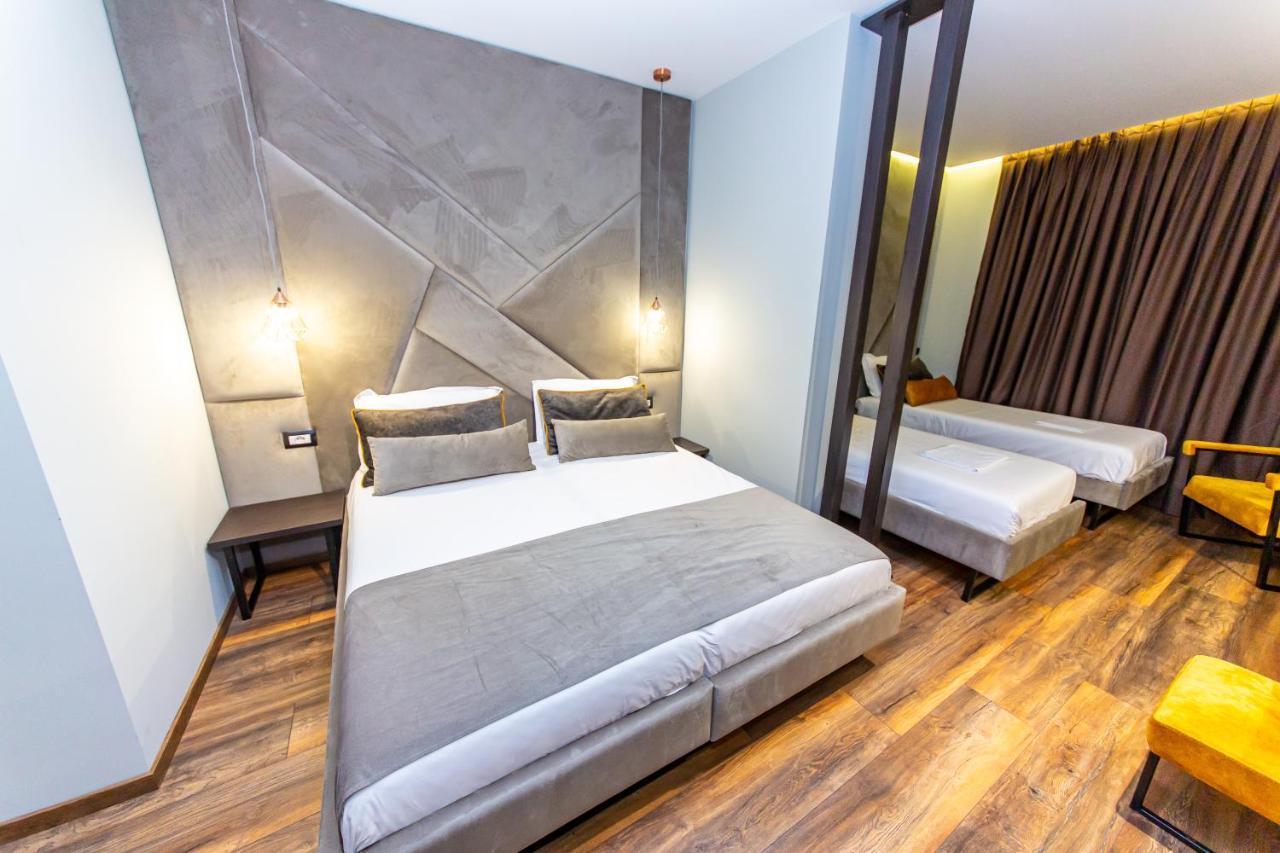 Habitación Cuádruple Deluxe con balcón - Planta baja