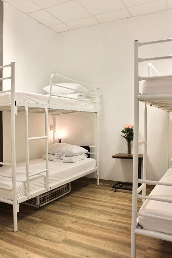 Cama en habitación compartida de 6 camas