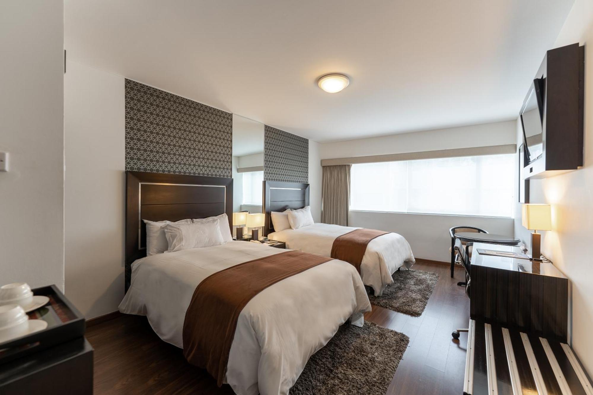 Quarto com Cama de Casal ou 2 de Solteiro