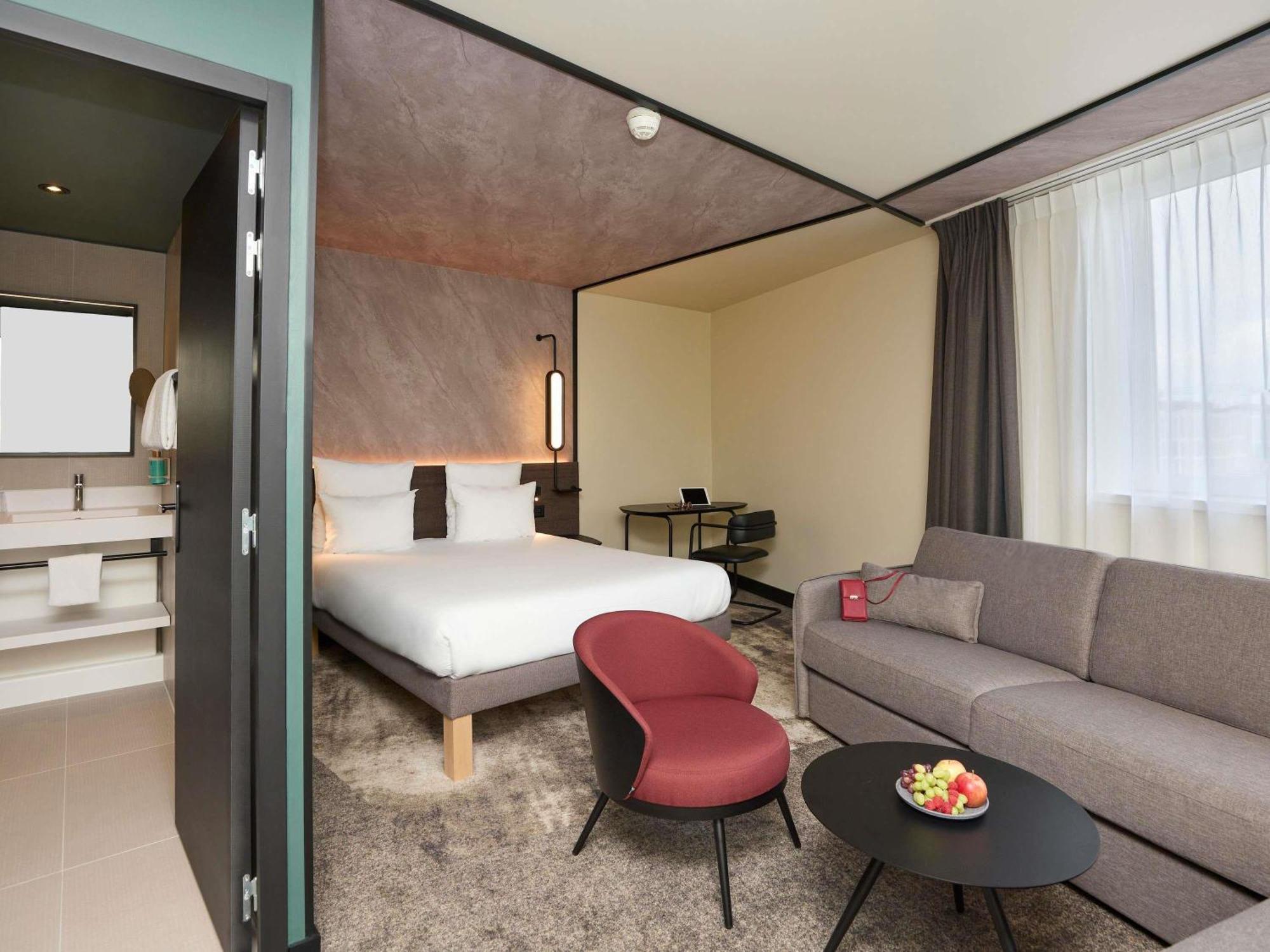 Junior Suite met 1 Queensize Bed en Bank