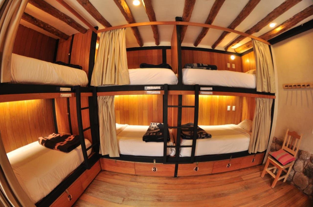 Posto Letto in Dormitorio Misto con 6 Letti e Bagno in Comune