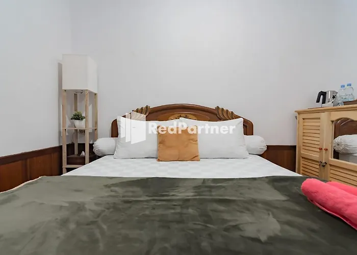 Langkar Guest House Syariah Mitra Reddoorz