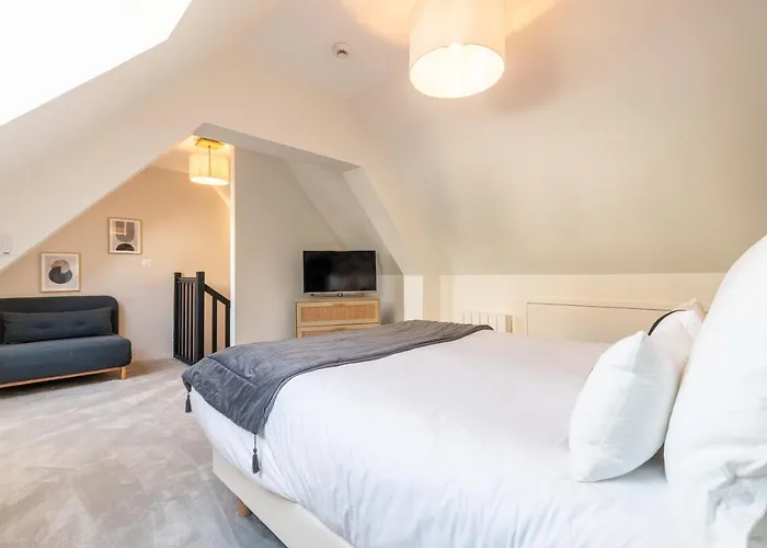 Hôtel Échappée en Baie - Chambres climatisées -Parking privé gratuit dont forfaits bornes électriques réservable