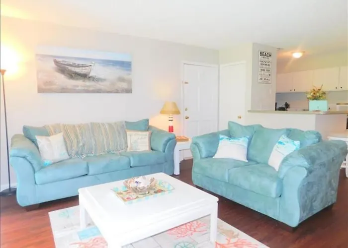 T15 Downstairs Beachy Quiet King Bed