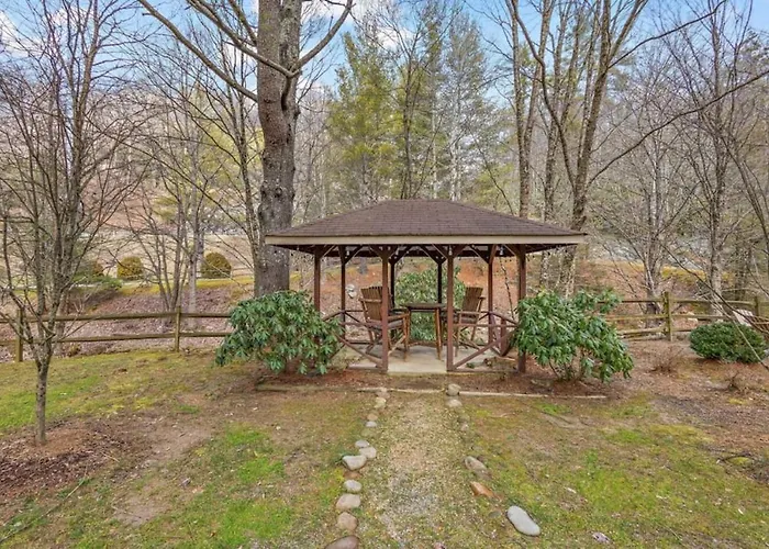 Picturesque Riverside Cabin With Fireplace And Porch