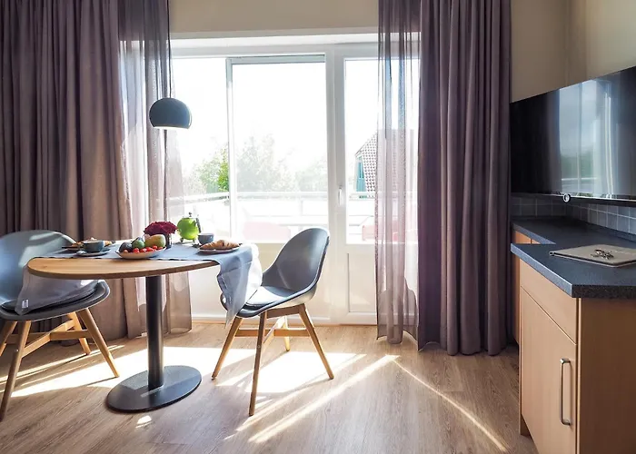 Antares Spiekerooger Gästehaus-Sonnengartenbalkon SüdWest - Wohnung 4