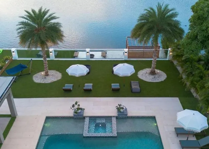Opulent Waterfront Villa By The Glamhomes