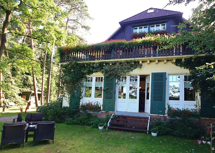 Strandvilla Hubertus Boltenhagen - Ferienwohnungen Apartment mit Parkplatz WLAN Küche Garten Grillplatz Waldbaden