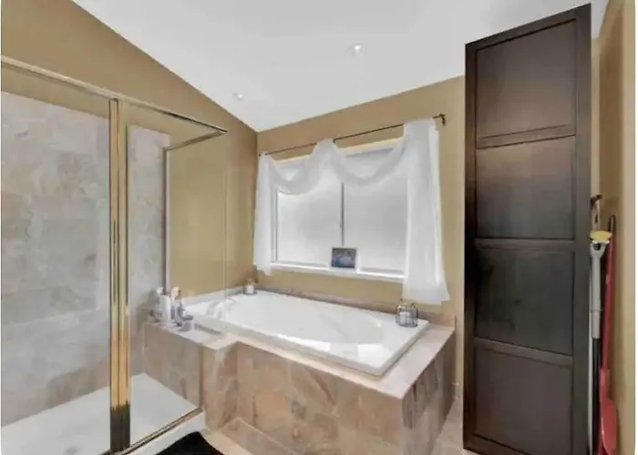A Master Suite With Own Kitchenette And Bath