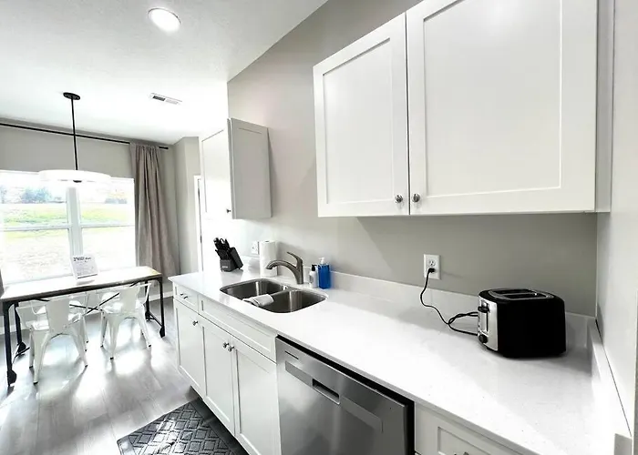 Central Cedar Falls Townhome - King Beds!