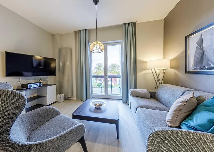 Boddenzeit - Moderne Ferienwohnung mit Nordbalkon, Wellnessbereich und Nähe zum Ostseestrand
