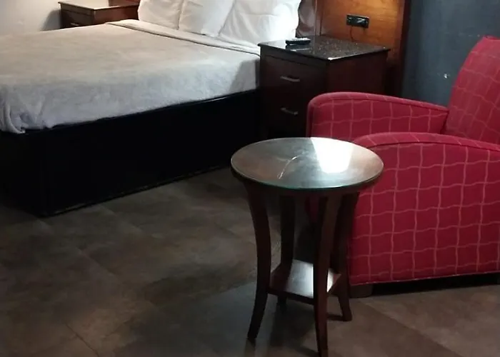 Queen Bed Hotel Suite 127