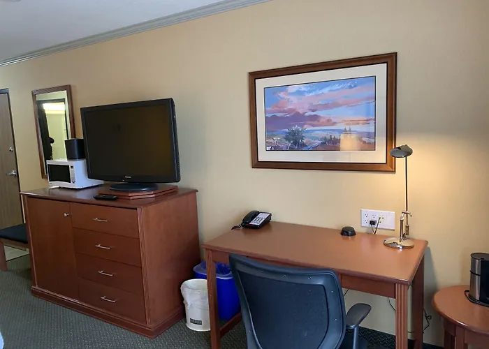 Merit Hotel & Suites