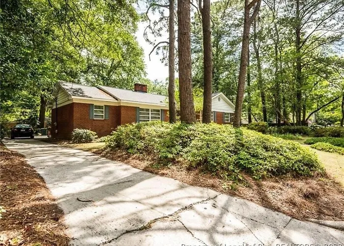 Central Located Large Home On Quiet Wooded Street