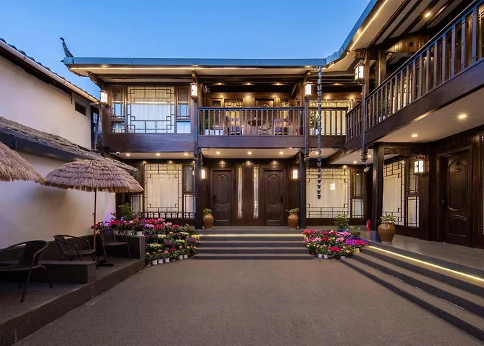 Golden Dragon'S Mountain Glow Inn Chinese Style Courtyard Of Lijiang Ancient Town Close To Main Streets Near By Dashiqiao Sifang Street,Big Water Wheels,We Offer Tickets Purchasing Services,Free Station Pick-Up For Three Nights Of,Provide Nutritious
