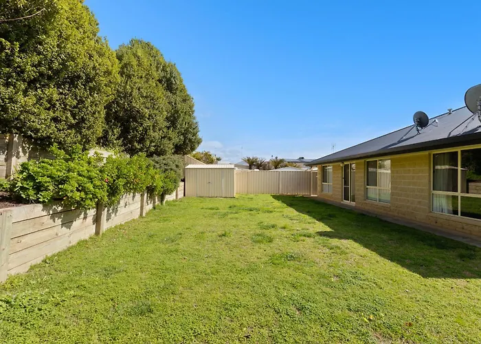Comfortable 4-Bedroom Home With Backyard Escape