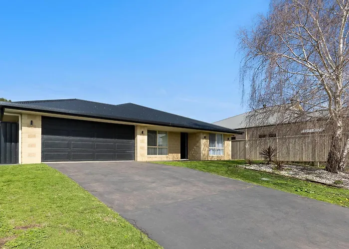 Comfortable 4-Bedroom Home With Backyard Escape