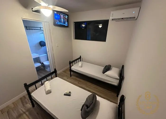 Suítes Modernas com Ar-Condicionado e Estacionamento