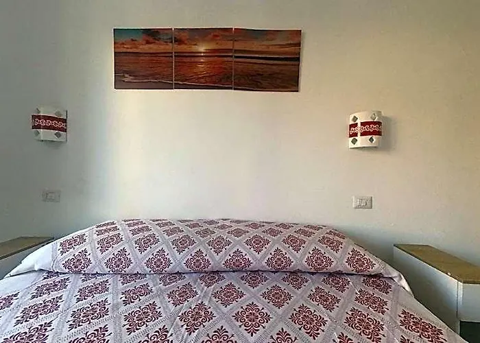 Charming Santantioco Red Apartment With 2-Way Air Con Uncovered Parking