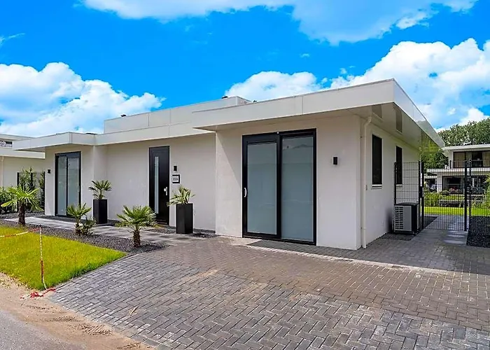 Villa With Covered Terrace And Jetty On The Water