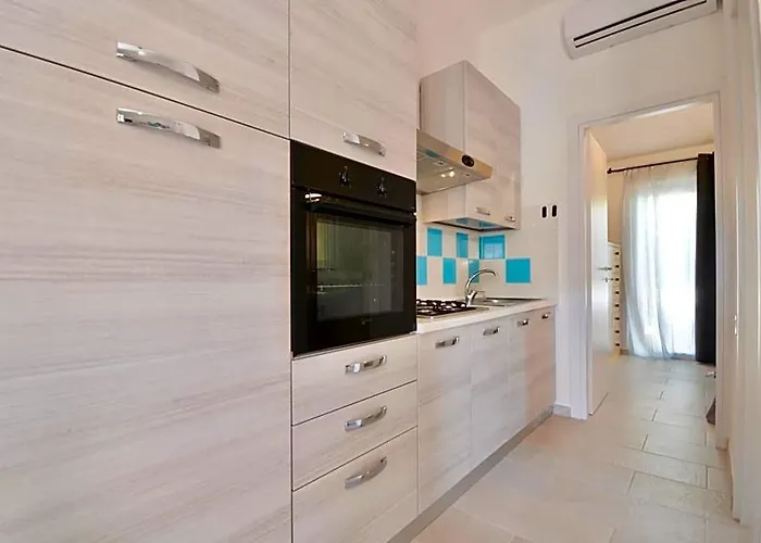 Residence In Costa Rei Just 450 Meters From The Beach, Apartments With Air Conditioning And Outdoor Private Area