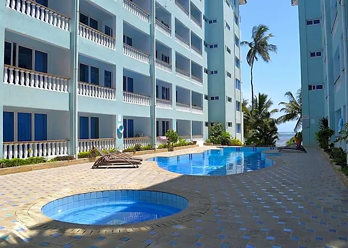Cowrie Shell Beach Apartments Official