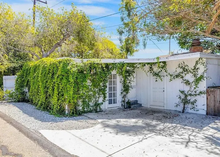 Vine-Covered Garden Suite | Queen + Patio