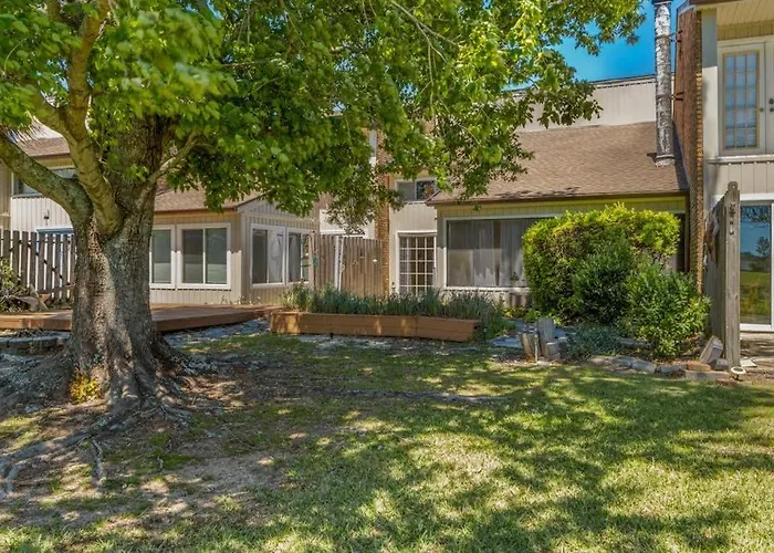 Dog Friendly Coastal Townhome With Golf Course Views Patios And Washer Dryer
