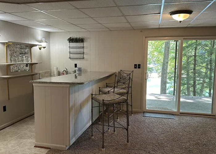 Humble Hideaway - Inviting Lakefront Home With Firepit, Balcony & W/D - Dog-Friendly