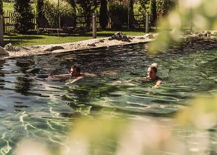 Wellness und Brunch Hotel MorgenZeit beheizter Naturteich Genuss Frühstück bis 13 Uhr Hochkönig Sommercard