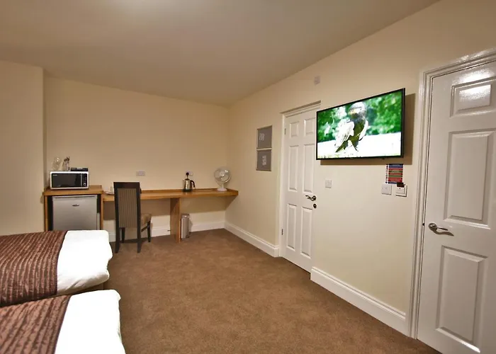 New County Hotel & Serviced Apartments By Roomsbooked